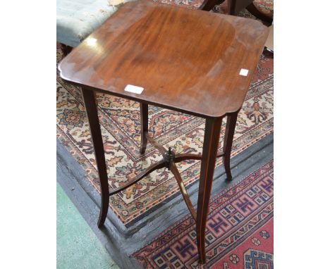 An Edwardian mahogany occasional table, shaped square top, splayed legs, X-stretcher centred by an urnular finial and underfi