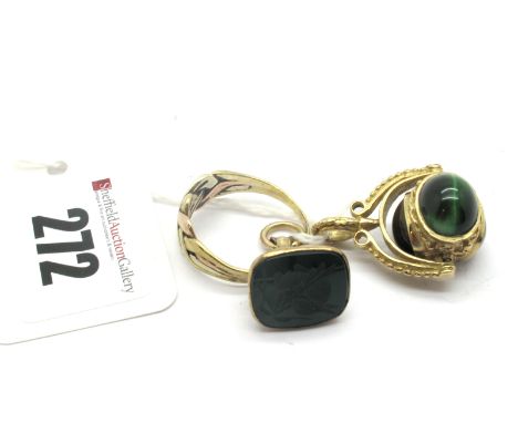 A 9ct Gold Puzzle Style Ring, together with a 9ct gold tiger's eye inset swivel fob pendant, and a seal fob type pendant. (3)