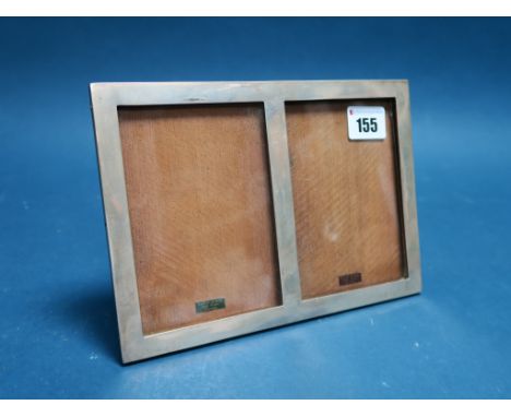 A Hallmarked Silver Mounted Double Aperture Rectangular Photograph Frame, CSG&Co, Birmingham 1938, of plain design, on wooden