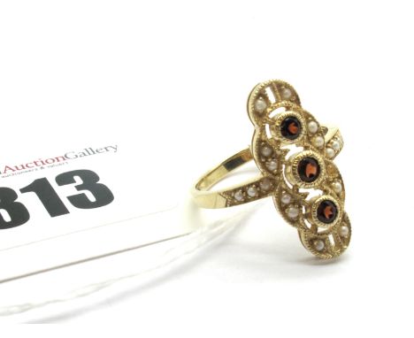 A 9ct Gold Edwardian Style Garnet and Pearl Set Ring, of elongated design, circular collet set (one pearl missing).