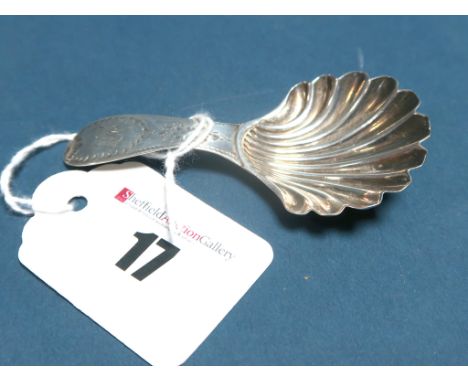 A Hallmarked Silver Caddy Spoon, possibly Hester Bateman (mark rubbed), London 1786, with shell bowl and bright cut engraved 