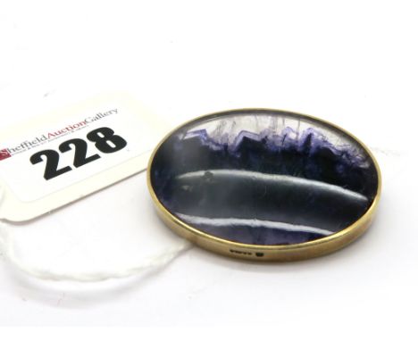 A 9ct Gold Oval Blue John Panel Brooch, collet set. 