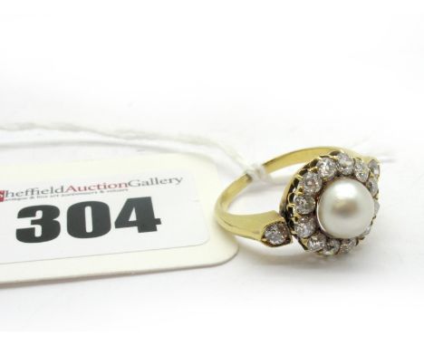 An Edwardian Style Pearl and Diamond Cluster Ring, single pearl set to the centre, within border of uniform old cut stones, b