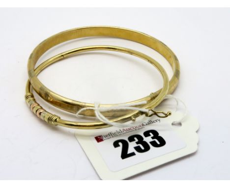 A Modern 9ct Gold Bangle, with three colour detail to the front; Together with A Plain Bangle, stamped "9kt". (2)