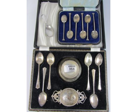 Hallmarked silver tea strainer, five spoons, caddy spoon, set of six coffee spoons cased, approx 6.5oz and one plated spoon C