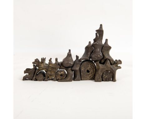 This original bronze sculpture includes thirteen interchangeable pieces that Israeli artist Aharon Bezalel made in a Brutalis