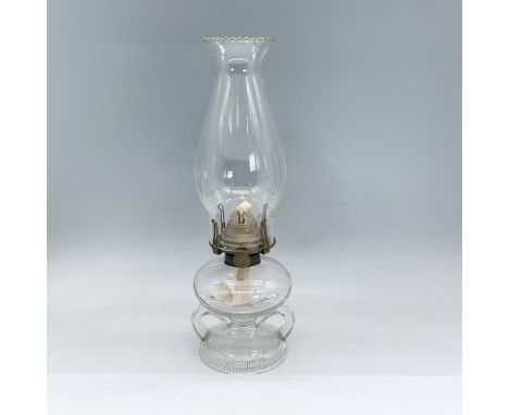 Clear glass oil lamp including chimney with bronze hardware. Dimensions: 12.5"H x 3.75" diaCondition: Age related wear. Small