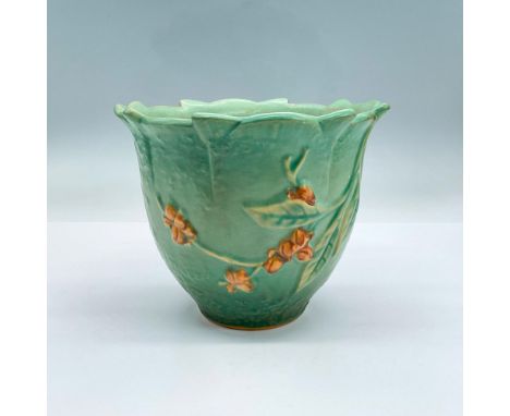 Earthenware planter in earthy green with burnt sienna flowers and green leaves design in low-relief. Roseville mark. Issued: 