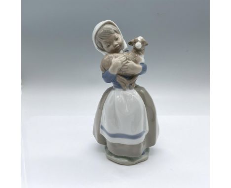 Glossy figure of a young girl holding a disgruntle-looking lamb. Nao backstamp. Dimensions: 4.5"L x 4.5"W x 8"HManufacturer: 