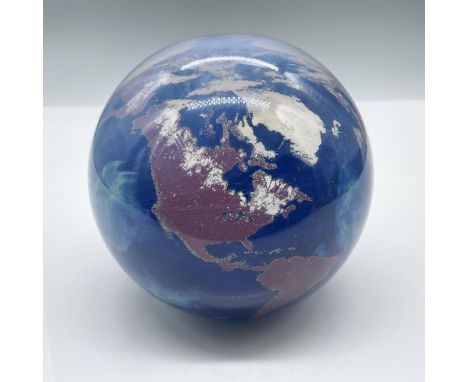 A handblown art glass paperweight with stunningly realistic globe details. Lundberg Studios signed and dated, 031706 to base.