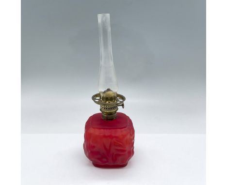 Red matte wrinkle textured glass oil lamp, clear chimney and bronze colored hardware. Dimensions: 3.25"L x 3.25"W x 10.25"HCo