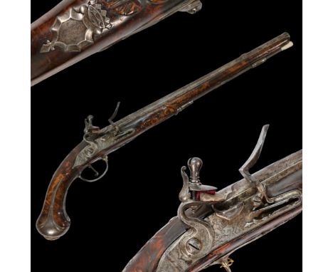 A Long flintlock pistol from the end of the 17th century signed Roy Alby, France. Steel round barrel, caliber 13 mm. Stock in