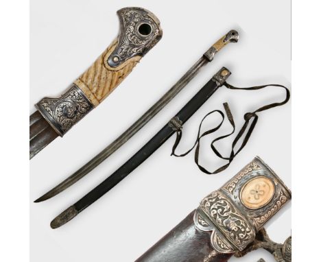A Shashka with scabbard and belt, silver, niello, engraving, Russia mid 20th century. A slightly curved steel blade with two 