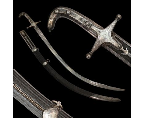 A beautiful 19th century Middle Eastern saber. The handle, guard and scabbard's elements are made of silver and decorated wit