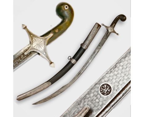 Saber with scabbard, silver inlay, Syria, 19th-20th century. A steel, curved blade with two fullers on each side. On one side