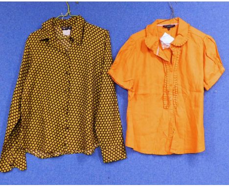An Agnes B polka dot silk blouse together with an orange short sleeve cotton shirt by Betty Jackson, as new with tags, (2)
