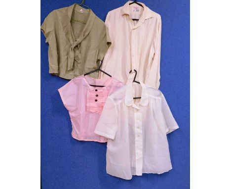 Four mid 20th Century ladies blouses to include a cream silk long sleeved blouse, an olive green cropped satin pussy bow neck