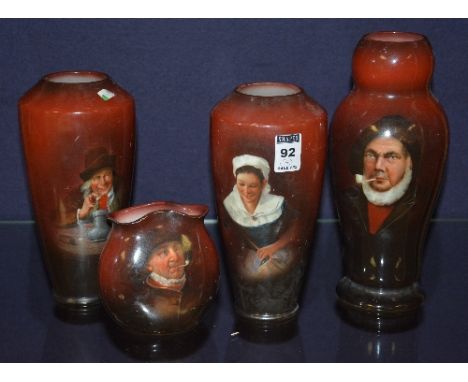 Four Continental porcelain vases, circa early 20th century, probably German, decorated with portrait panels on two tone red g