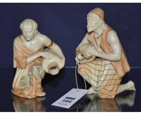 Two Royal Worcester figures of water carriers, in the form of a male and female, pattern no 637 & 223, red stamp to underside