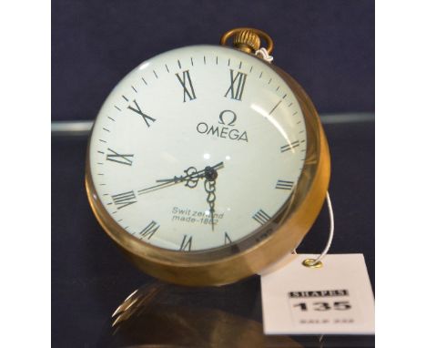 A desk clock marked for Omega, made in  Switzerland 1882, 12cm diametre CONDITION REPORT: Lot 135 - In good condition, minor 