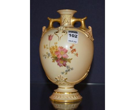 A Royal Worcester blush ivory porcelain vase, decorated with hand painted floral panels and gilding, pattern no 1654, reg no 