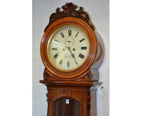 A Victorian mahogany drumhead eight day longcase clock by Alex Kerr of Dundee, the hood with carved floral mount above glazed