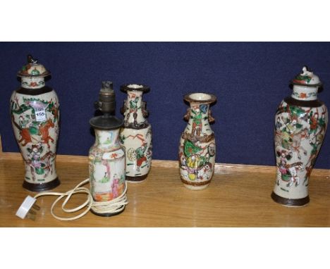 A pair of Japanese crackle glaze vases with covers, decorated with Samurai warriors, 31cm high, also with two similar vases a
