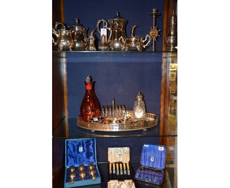 A quantity of plated wares, to include silver mounted and crystal sugar sifter, tea set, and ruby coloured glass decanter etc