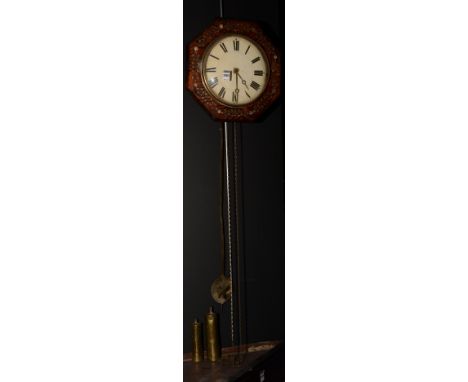 A Victorian 'Wag at the Wa' wall clock, with mother of pearl inlay to octagonal frame, white enamel dial, with two brass coat