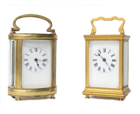 French oval carriage clock timepiece, within a brass case, 6.25" high; also another French carriage timepiece within a gilded
