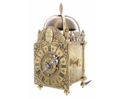 Fine and rare miniature hook and spike brass verge lantern clock, the 3" brass arched dial signed John Bushman, London on an 