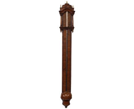 Rare early walnut stick barometer in need of restoration, the paper scale indistinctly signed Manticha..., flanked by turned 