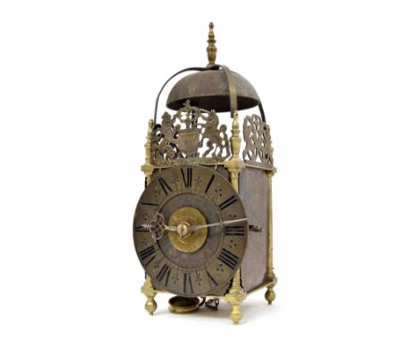 Antique brass hoop and spike lantern clock in need of restoration and with later parts, the 6.5" brass chapter ring enclosing