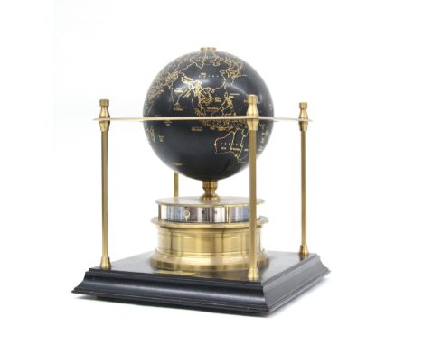 'The Royal Geographical Society World Clock' manufactured by Franklin Mint 1988, the black and gilded globe over a horizontal