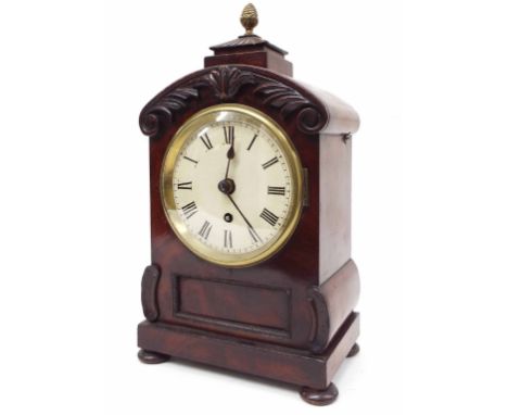 Mahogany single fusee bracket clock, the 5" cream dial within a panelled and foliate carved case, with rounded pediment and s