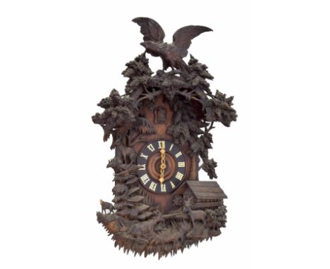 Good Black Forest Beha style two train cuckoo clock, the 7.25" dial within a finely carved case depicting a chalet and deer a