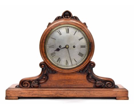 Light oak double fusee shop counter clock striking on a gong, the 7" silvered dial within a foliate carved case and upon a st