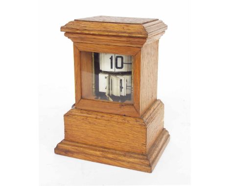 Rare slave and mechanical conversion electric ticket clock within a stepped oak glazed case, 6.75" high 