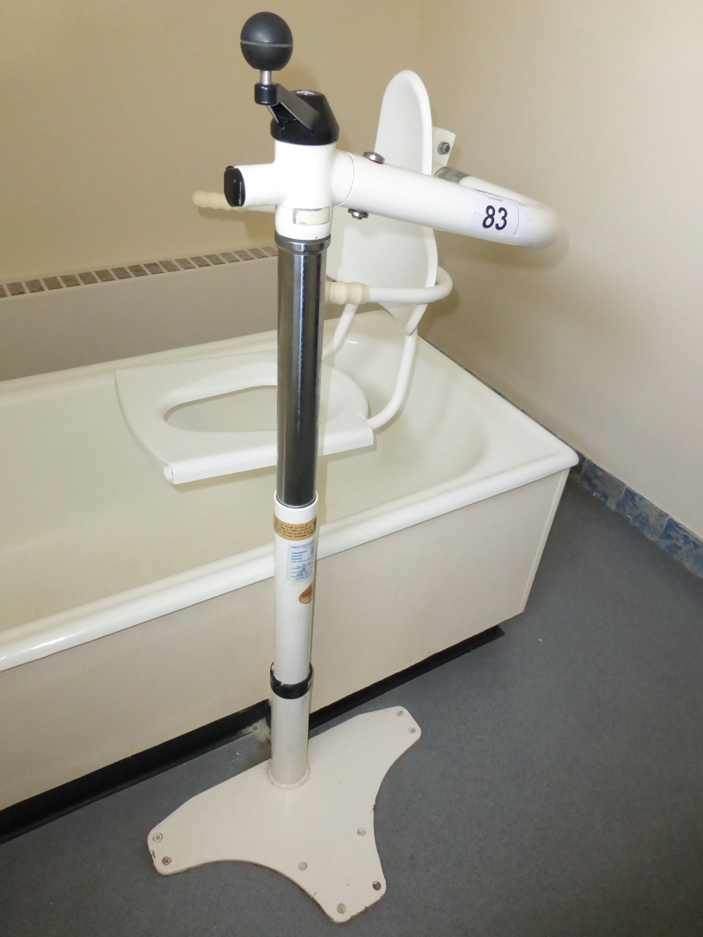 1 Arjo autolift manually operated bath hoist/chair (located in room 21)