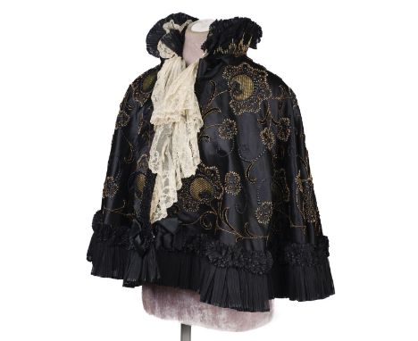* Clothing. A beaded black cape, Liverpool: Cripps, Sons & Co., circa 1910, black satin cape, heavily beaded overall with a v