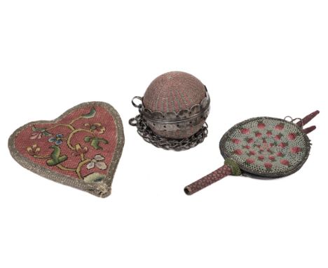 * Sewing. An 18th century girdle pin cushion ball, spherical pincushion composed of pink threads interwoven with silver metal