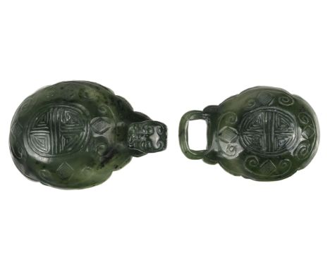 * Jade. Chinese spinach jade belt hook, two oval parts, one side carved with a feline head forming the hook, the other simila