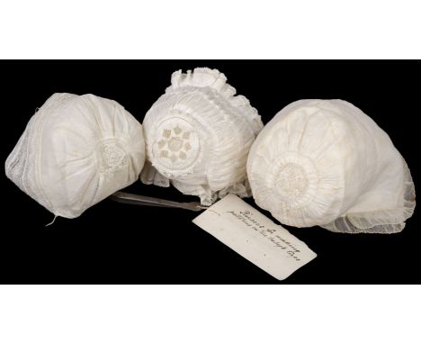 * Clothing. Three hollie point lace baby bonnets, late 18th century, all of fine white lawn and crown of Hollie point lace: t