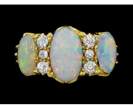 Early 20th century gold three stone opal and six stone old cut diamond ring, stamped 18ctCondition Report:Approx 6.7gm, size 