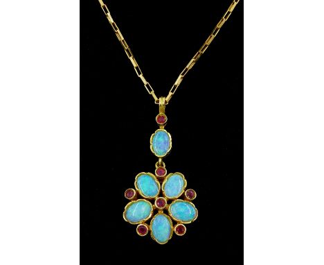 9ct gold opal and ruby flower pendant necklaceCondition Report:Approx 4.55gm, pendant length = 3.5cm, chain length = 51cm