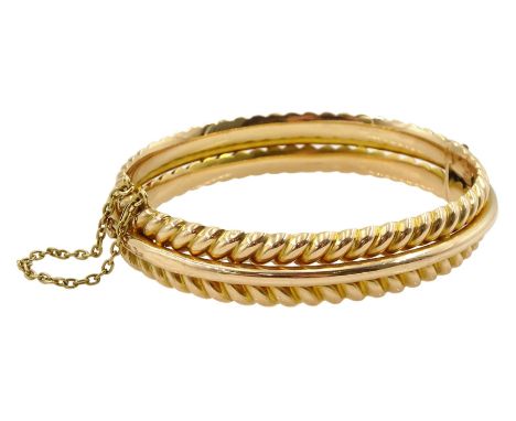 Early 20th century fancy link hinged bangle, stamped 15ctCondition Report:Approx 20.4gm, non magnetic, a few light dents to c