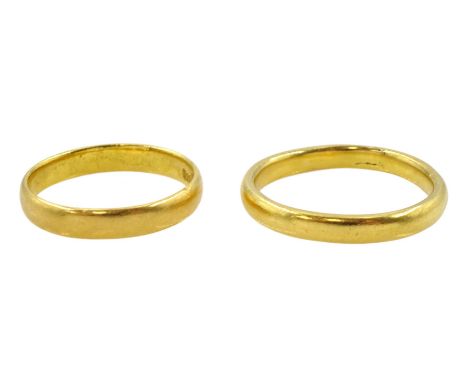 Two 22ct gold wedding bands, both hallmarkedCondition Report:Approx 8.5gm, Q-R &amp; O