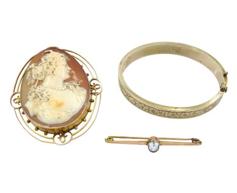 Victorian large gold cameo brooch, gold aquamarine brooch, both stamped 9ct and a low carat gold hinged bangle, with engraved