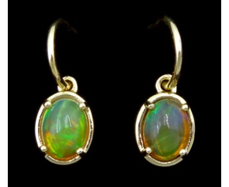 Pair of 9ct gold opal pendant stud earrings, stamped 9KCondition Report:Approx 2.7gm, length = 17mm, well presented and in ve