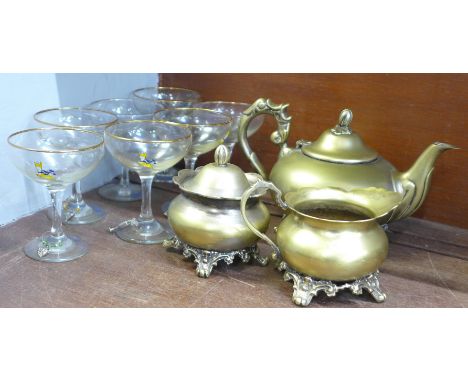 Seven Babycham glasses, yellow and white fawns and a three piece tea service